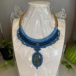 Necklace features a blue macrame' design set with natural Labradorite gemstone